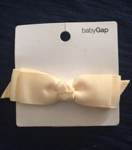 NWT (2) Baby Gap Small Ivory Bow Clips - Picture 1 of 3