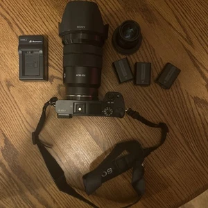 Sony A6000 Camera with Two Lenses ; Sony 18-104 F4, Fotasy 35 F1.7 , 5 Batteries - Picture 1 of 9