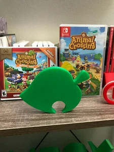 Cartel de logotipo de videojuego Animal Crossing Leaf decoración ~ 4,5 pulgadas (videojuego, decoración, g - Imagen 1 de 7