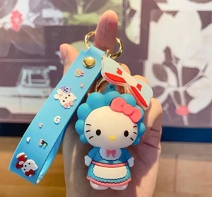 Sanrio HELLO KITTY Viola Portachiavi Borsa Porta Charm Zaino Regalo NUOVO - Foto 1 di 1