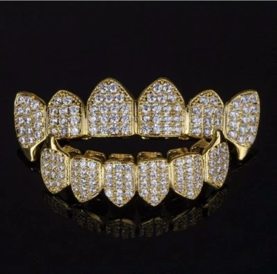 Gold Teeth Bling Grillz - Hipoalergénico, piedras circonitas heladas, goteo de fuego, flexión de moda Foto 1 de 4