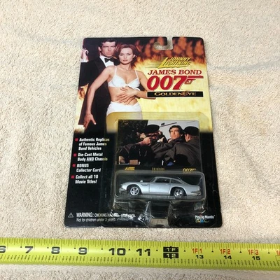 Coche Aston Martin 1965 Goldeneye 007 1998 Johnny Lightning James Bond de colección Foto 1 de 4