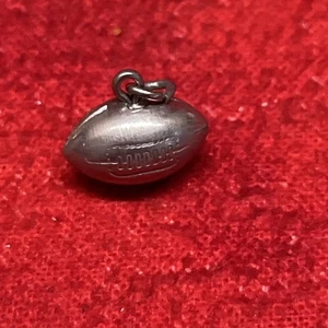 VINTAGE SILVER TONE FOOTBALL PENDANT CHARM (1) - Picture 1 of 3