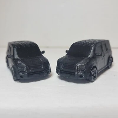 Modelo de coche Honda Element escala 1:64 paquete de 2 67 mm de largo NEGRO Foto 1 de 4