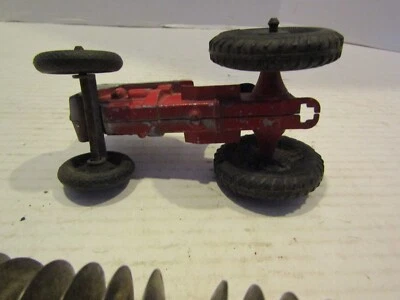 VINTAGE TOOTSIETOY WIDE FRONT TRACTOR FARM TOY FORD WITH DISC PLOW - Image 1 of 4