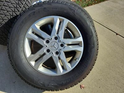 18" MERCEDES BENZ OEM G550 G WAGEN WHEELS W/ BLIZZAK SNOW TIRES - Image 1 of 4