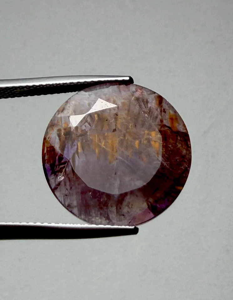 S026- Super Siete, Piedra de Melodía, Cristal Sagrado, Armonía, Cacoxenita en Amatista Foto 1 de 4