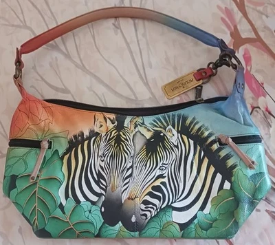 Bolso de mano Anuschka de cuero pintado a mano cebra safari cremalleras laterales rectangular Foto 1 de 4