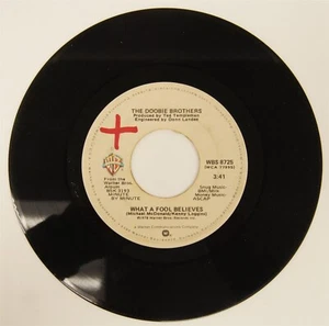 THE DOOBIE BROTHERS 45 RPM WHAT A FOOL BELIEVES/DON'T STOP TO WATCH THE WHEELS - Picture 1 of 2