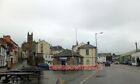 PHOTO  PENZANCE HARBOUR WEIGHBRIDGE OFFICE ON THE LEFT IS QUAY STREET WITH A GOL