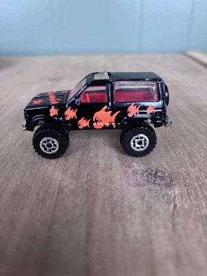 Matchbox Ford Bronco II Piranha 1987 1:57 Tailandia Foto 1 de 4