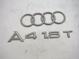 Audi A4 1999 tracción delantera emblema A/T insignia logotipo fabricante de equipos originales 2000 2001 - Imagen 1 de 6