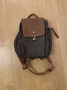 Calvin Klein Brown Monogrammed Backpack with gold hardware - Picture 1 of 17