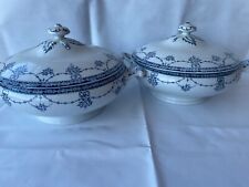 2 THOMAS TILL & SONS ANTIQUE BLUE & WHITE COVERED TUREENS IN RAJAH PATTERN.