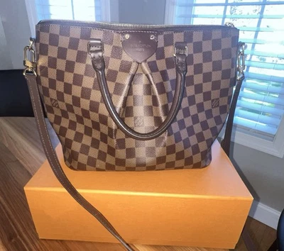 Louis Vuitton Damier Level Sienna MM Foto 1 de 4