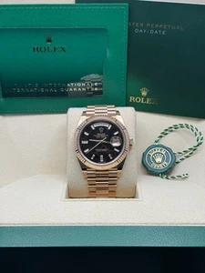 Rolex Day-Date 40 Eisenkiesel Baguette Dial 228235 - 2021 - Picture 1 of 7