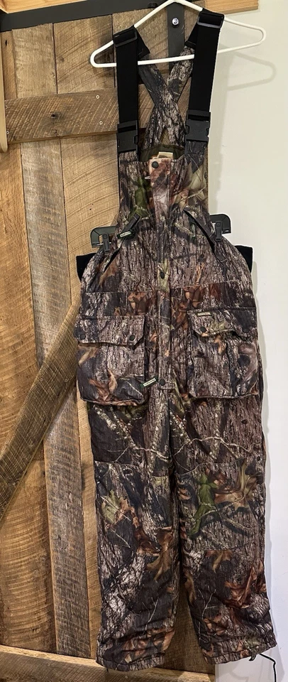 Mono con tirantes Remington para hombre grande marrón Realtree Break Up caza cremallera aislada Foto 1 de 4