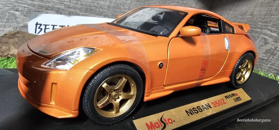 Coche diecast Nissan 350Z Nismo S-Tune 2004 edición especial Maisto 1:18 de colección Foto 1 de 4