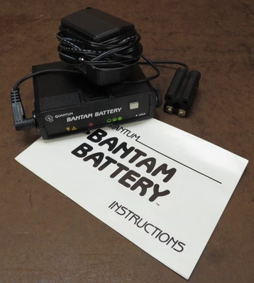 Quantum Bantam bateria preta bateria externa com carregador folheto informativo funcionando - Imagem 1 de 4