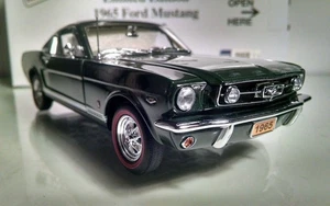 1965 Ford Mustang GT 2+2 black in 1:24 scale by Danbury Mint - Picture 1 of 4