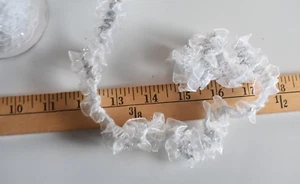 WHITE & SILVER METALLIC TRIM ON ELASTIC 5 1/2 YARDS LONG X 1 " WIDE - Picture 1 of 2