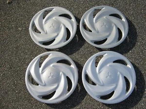 Genuine Mitsubishi Eclipse 14 inch hubcaps wheel covers - Picture 1 of 23