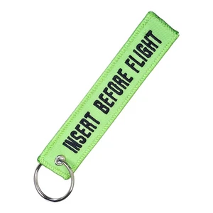 INSERT BEFORE FLIGHT EMBROIDERED KEYCHAIN BAG TAG AIRPLANE TRAVEL TAB GREEN - Picture 1 of 2