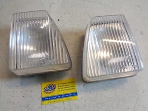 COPPIA PLASTICHE FANALI ANTERIORI VOLKSWAGEN PASSAT B2 - DAL 81 AL 86 - HELLA - Imagen 1 de 3
