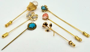 Surtido de 6 alfileres de palo, todos con motivo floral o mariposa. - Imagen 1 de 4