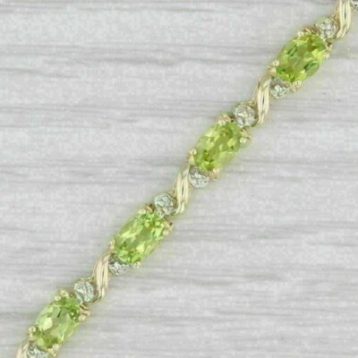 3Ct Oval Cut Lab Created Peridot Women's Tennis Bracelet 14K Yellow Gold Plated - Image 1 of 4