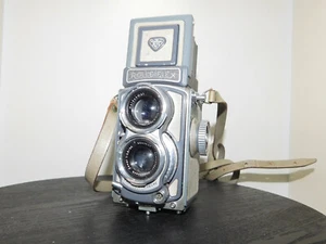 Cámara fotográfica TLR gris bebé Rolleiflex 4x4 con estuche original y 1 lente y funda - Imagen 1 de 16