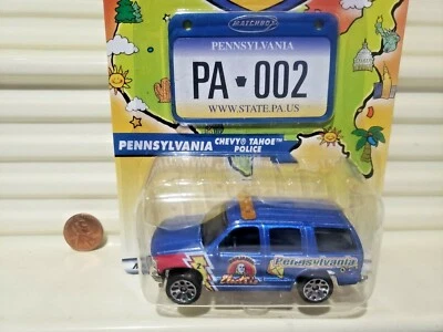 2001 Matchbox Across America PENNSYLVANIA CHEVROLET TAHOE POLICE New On C9 Card - Image 1 of 3