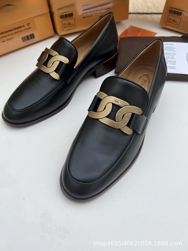 TOD’S Mocassini slip on donna Tod's in pelle con bottoni oro scarpe