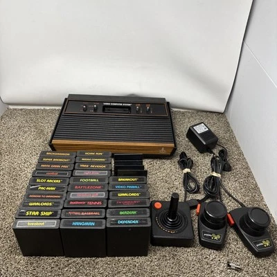 Atari 2600 System Bundle with Console, 30 Games, Joystick, Paddles, and More LOT - Image 1 of 4