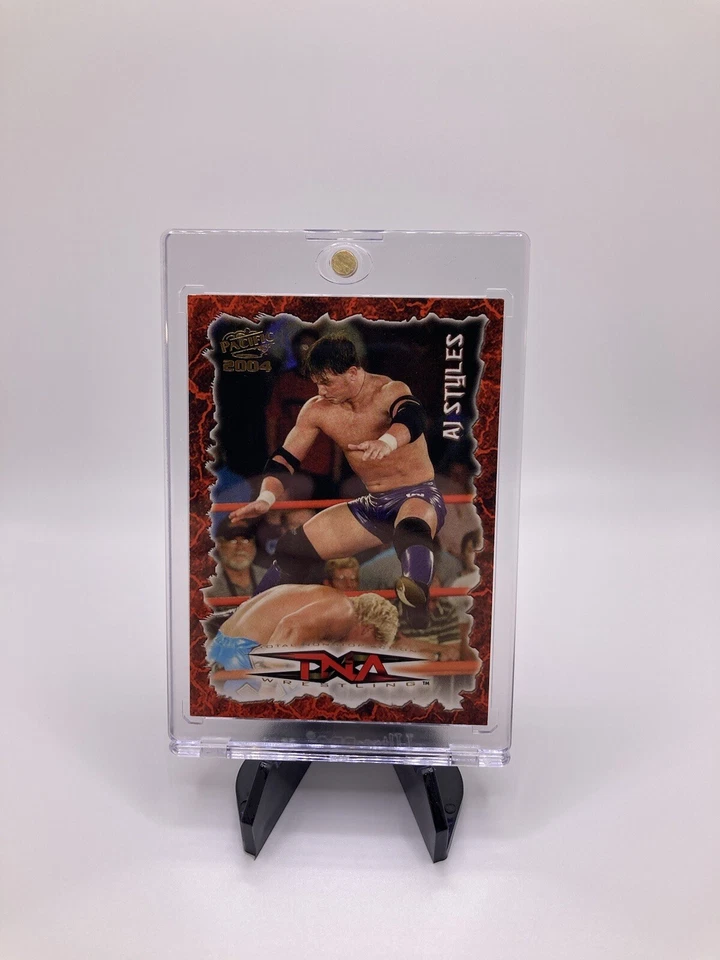 Tarjeta de novato AJ Styles TNA 2004 variante letra dorada Foto 1 de 4