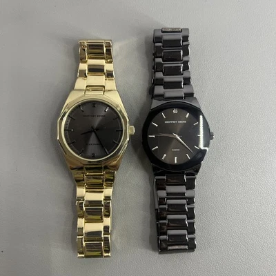 2 elegantes relojes Geoffrey Beene para hombre con esfera negra y diamante, negros y dorados Foto 1 de 4