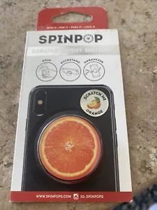 Spinpop Scratch & Sniff Edition ORANGE Phone Holder New sealed - Picture 1 of 2