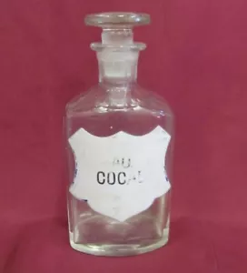 19Jh. ANTIKE MEDIZINISCHE APOTHEKER KOKA KOKAIN LEERE GLASFLASCHE PORZELLAN ETIKETT - Bild 1 von 9