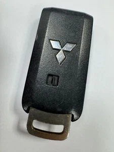 GENUINE MITSUBISHI 2 BUTTON REMOTE SMART KEY FOB TESTED OMRON GHR-M004 - Picture 1 of 4
