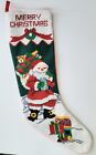 COMPLETED NEEDLEPOINT CHRISTMAS STOCKING, SANTA WITH HIS BAG OF TOYS
