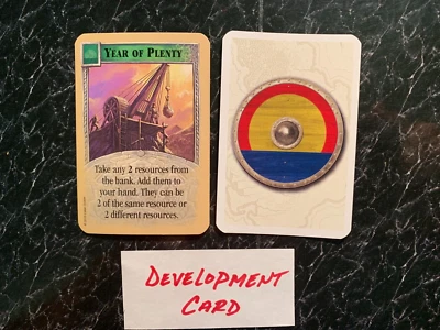 Tarjeta de desarrollo Catan año de abundancia 2019 Klaus Teubers Trade Build Settle Foto 1 de 2