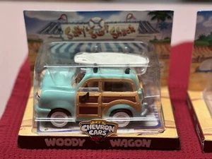 1999 Chevron Cars Woody Wagon Car w/ Surf Board New In Box - Picture 1 of 3