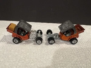 Lotto 2 Topper VINTAGE 1970 Johnny Lightning TNT Rosso e (Arancione come ricambi auto) - Foto 1 di 5
