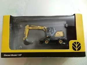 Modellino Trattore NEW HOLLAND CONSTRUCTION SCALA 1:87 DA COLLEZIONE. - Foto 1 di 3