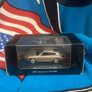 Porsche 911 Carrera (Typ 996) beige metallic, Schuco 1:43 (WAP 020 048 97) NEU - Bild 1 von 8
