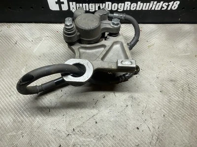 Pinza de freno trasera Yamaha R6 2006 2007 y soporte OEM línea de freno azul Foto 1 de 4