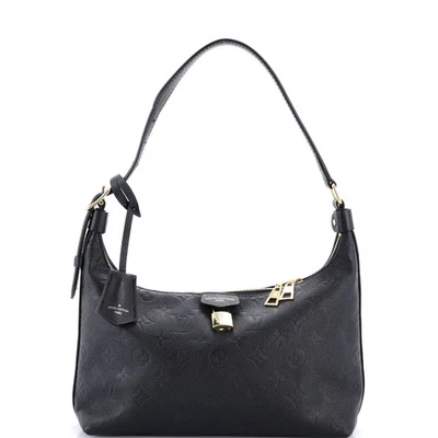 Bolso de mano Louis Vuitton Sac Sport casi nuevo monograma cuero Empreinte Foto 1 de 4