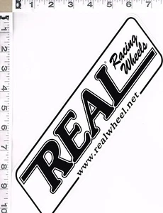 NEW, REAL RACING WHEELS STICKER, 11" X 3", BLACK WRITING ON WHITE BACKGROUND - Bild 1 von 4