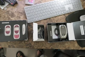 NEW Siemens SL55 Mini Slider Mobile Phone in Original Box Titanium - Picture 1 of 5