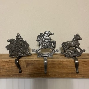 Vintage Grandeur Noel Cast Iron Christmas Mantel Stocking Holders Set of 3 - Picture 1 of 8